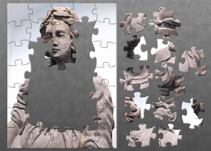 Partially completed online jigsaw, with outline completed and jigsaw pieces scattered around.