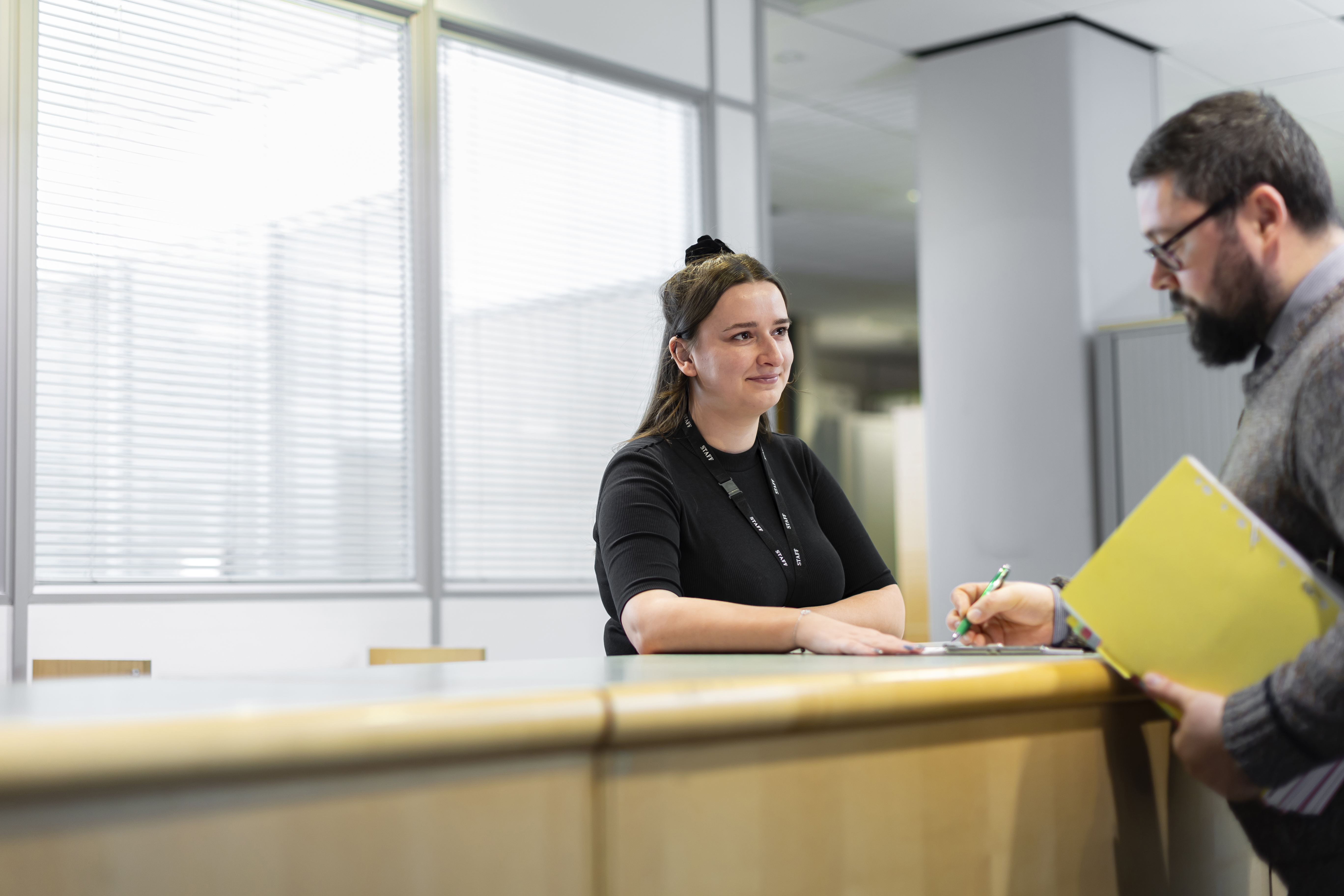 signing document at reception